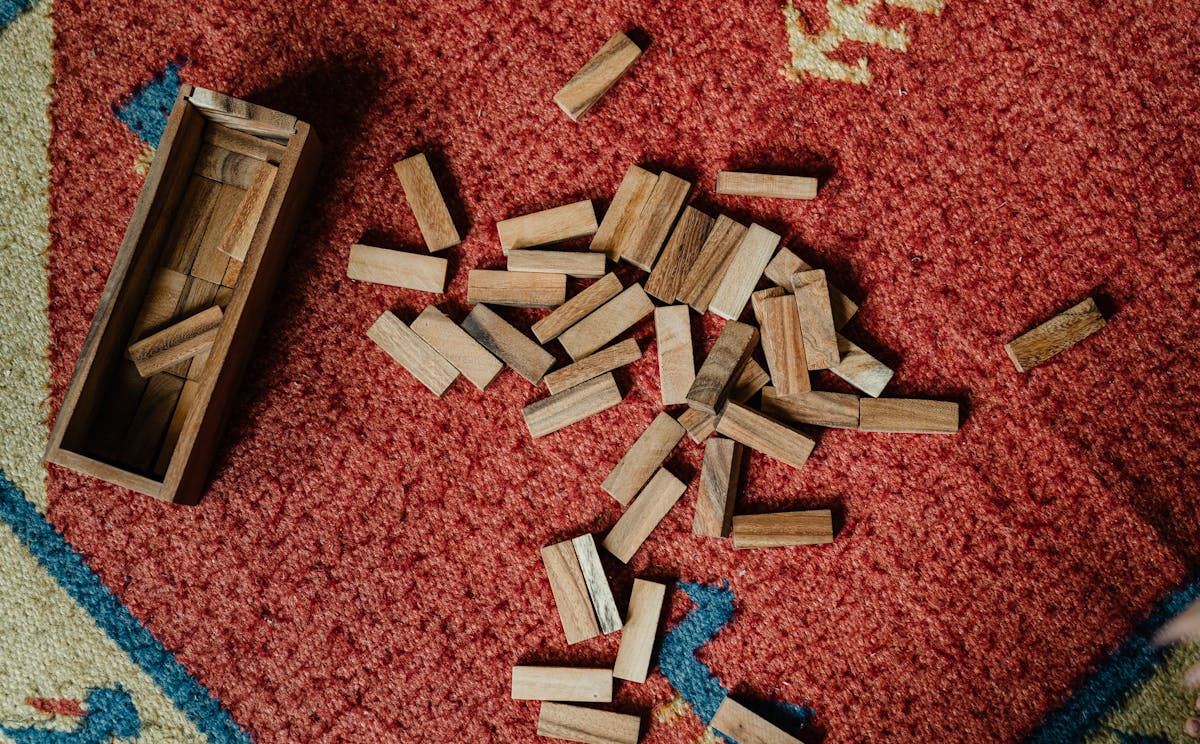 Brass: Birmingham vs Brass: Lancashire — industrial Euro game components on a wooden table
